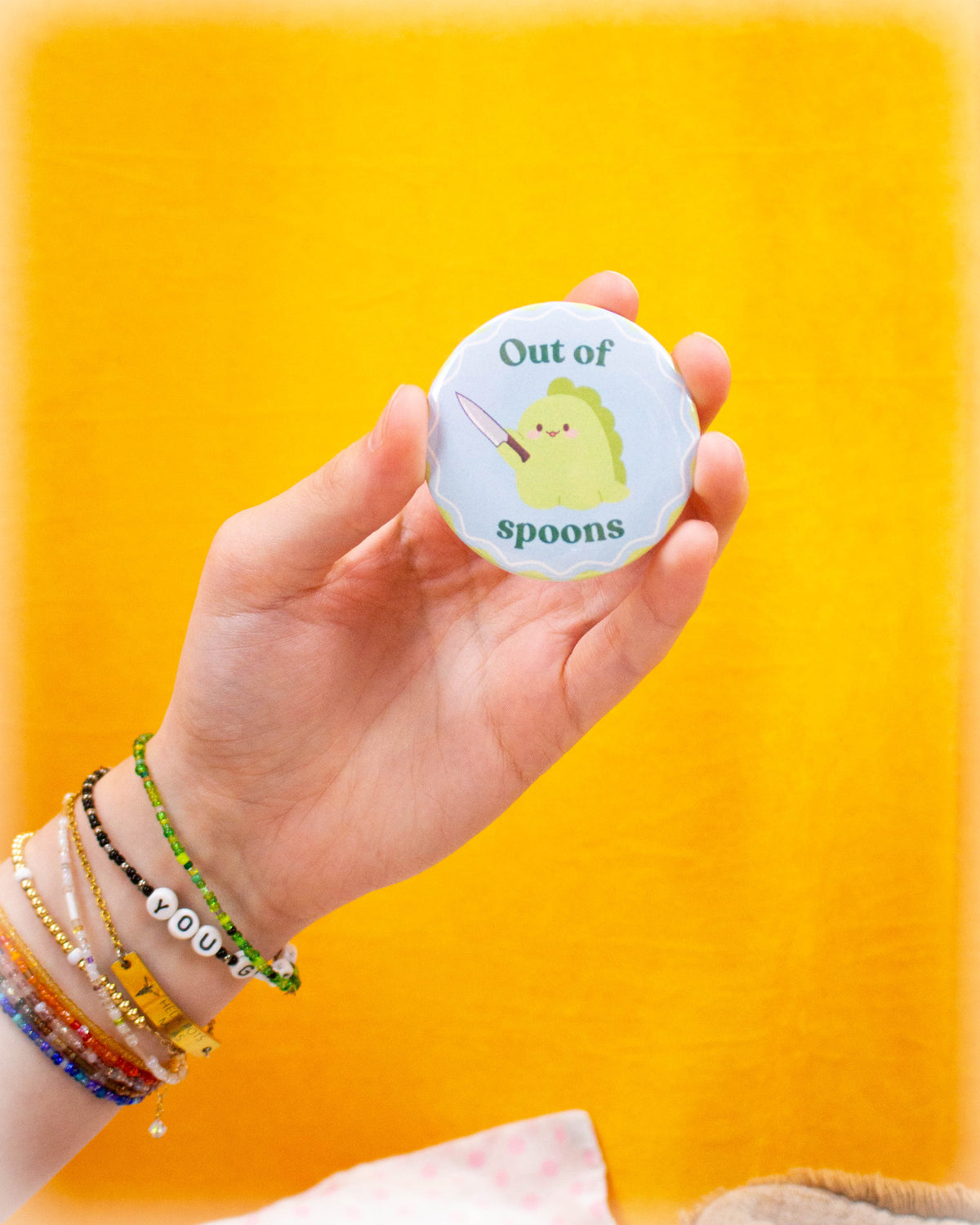 "Out of Spoons" Dinosaur Pinback Button
